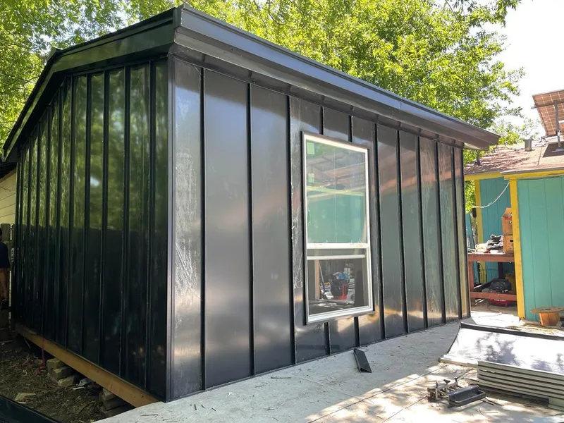 Black standing seam metal wall panels for Metal Roof Installation in Miami